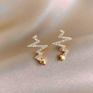 Gold heart beat stud earrings